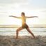Woman, yoga and meditation on the beach for zen, spiritual wellness or workout in the sunset outdoo